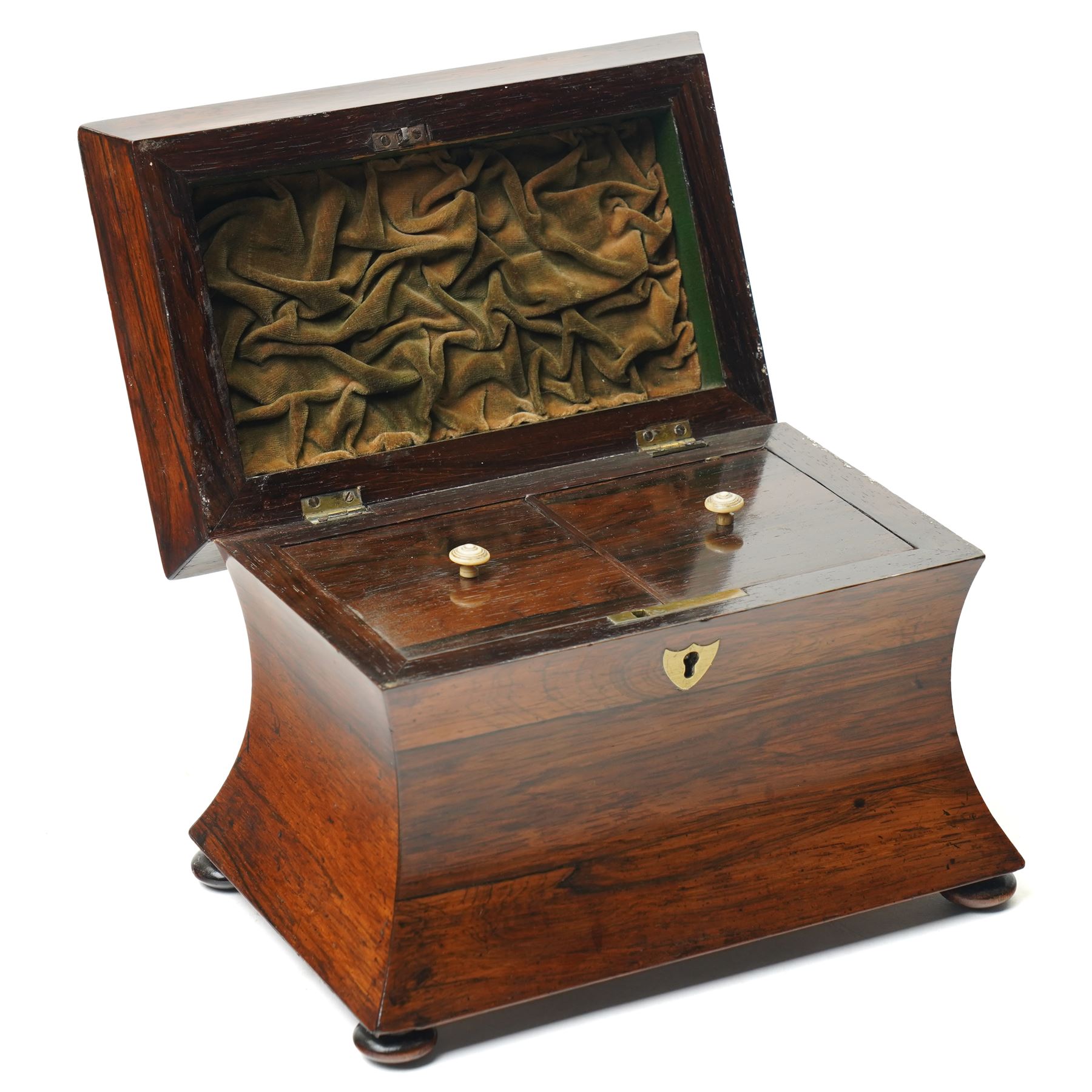 Early 19th century rosewood tea caddy of waisted sarcophagus form, twin compartments, on compressed bun feet, brass keyplate, H17cm W22cm 