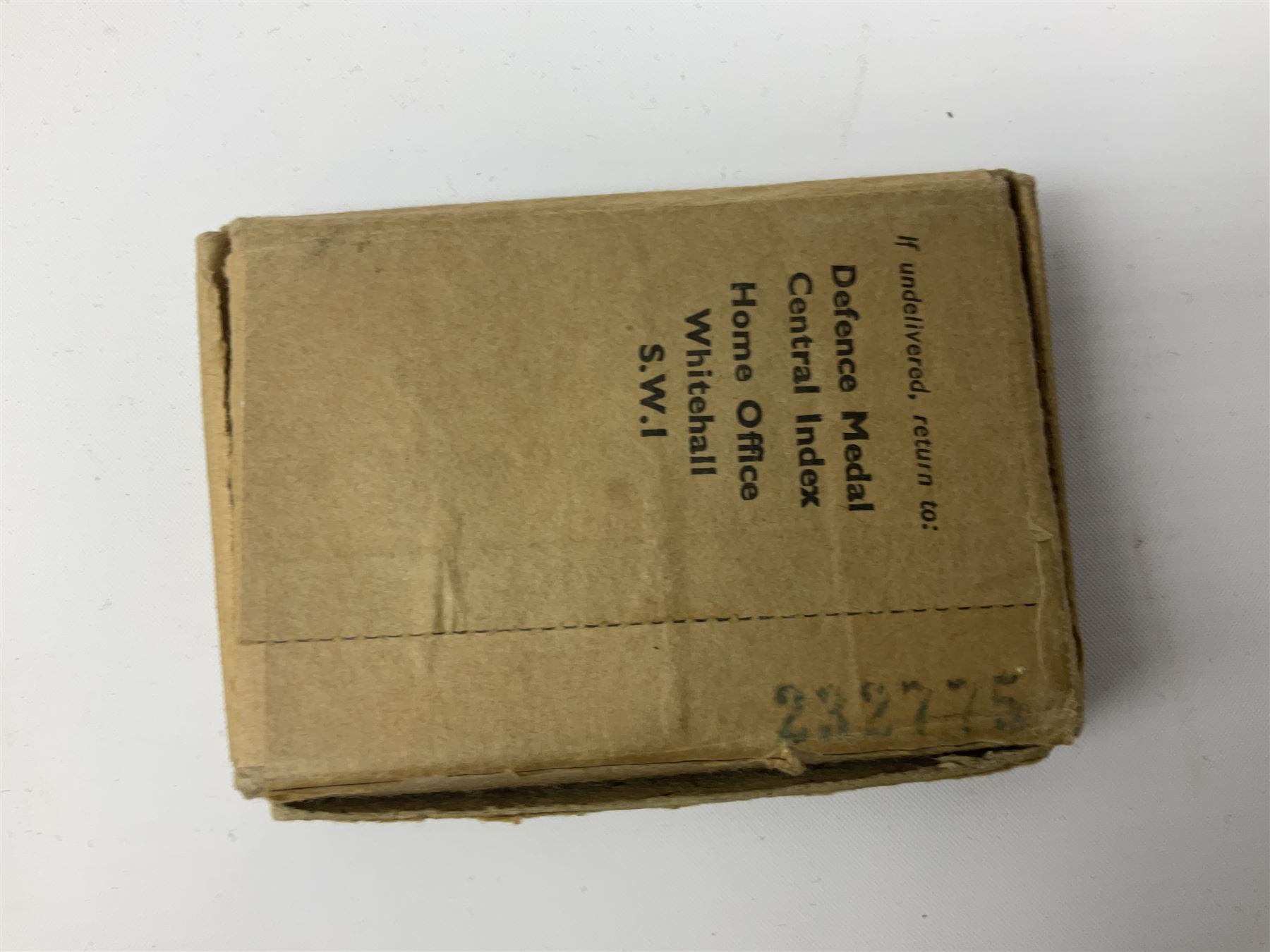 Royal Artillery 9ct gold and enamel sweetheart brooch in original box; together with Royal Artillery shoulder title, brass badges and buttons; and WW2 Defence Medal in issue box to 232775 addressed to Mrs. J.M. Morgan