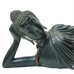 Late 20th century bronzed figure of a reclining buddha L64cm