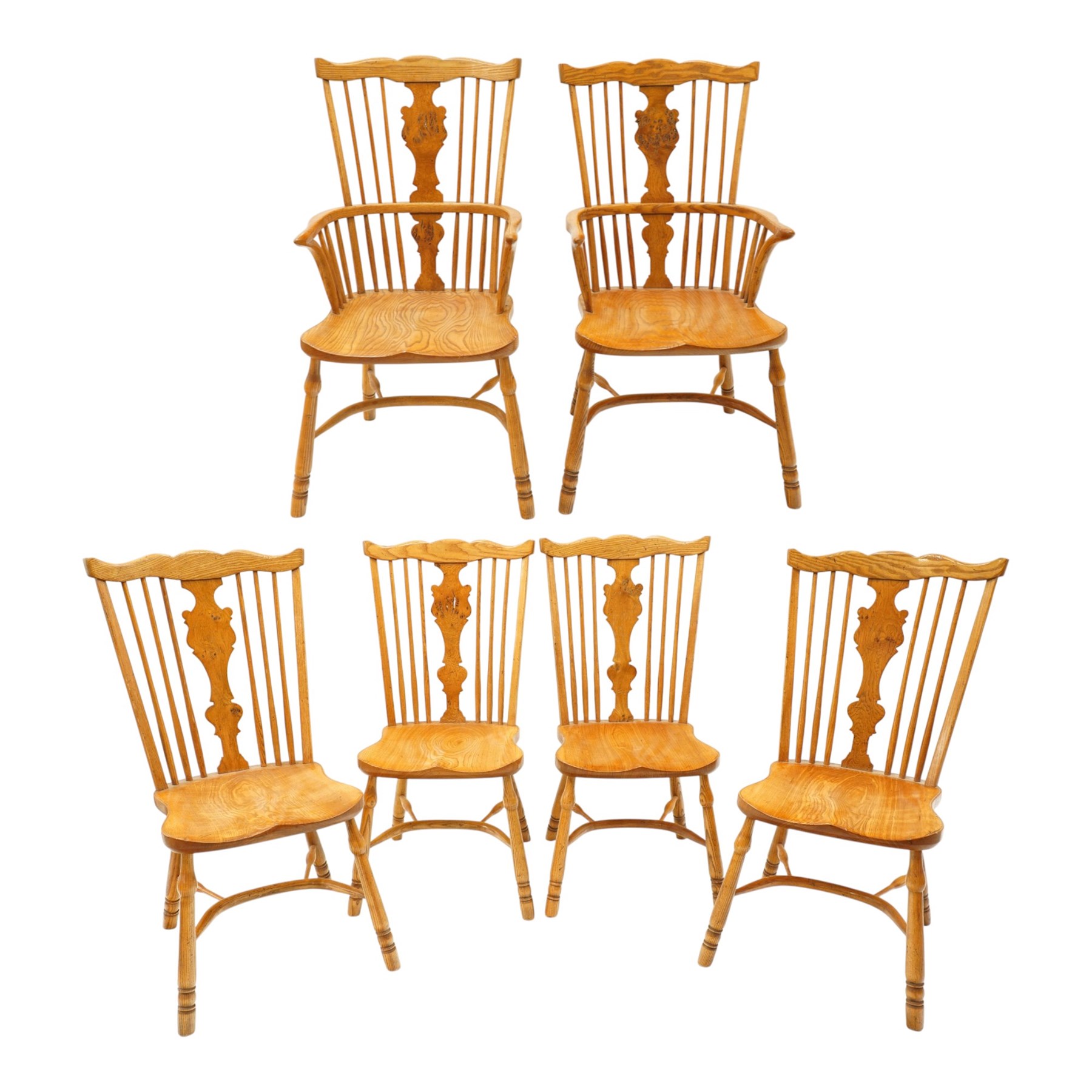 Quality set of six (4+2) golden figured and burr oak Windsor chairs, the yoke-shaped cresting rail over a vasiform shaped splat and spindle back, shaped saddle seat raised on turned supports united by crinoline stretcher