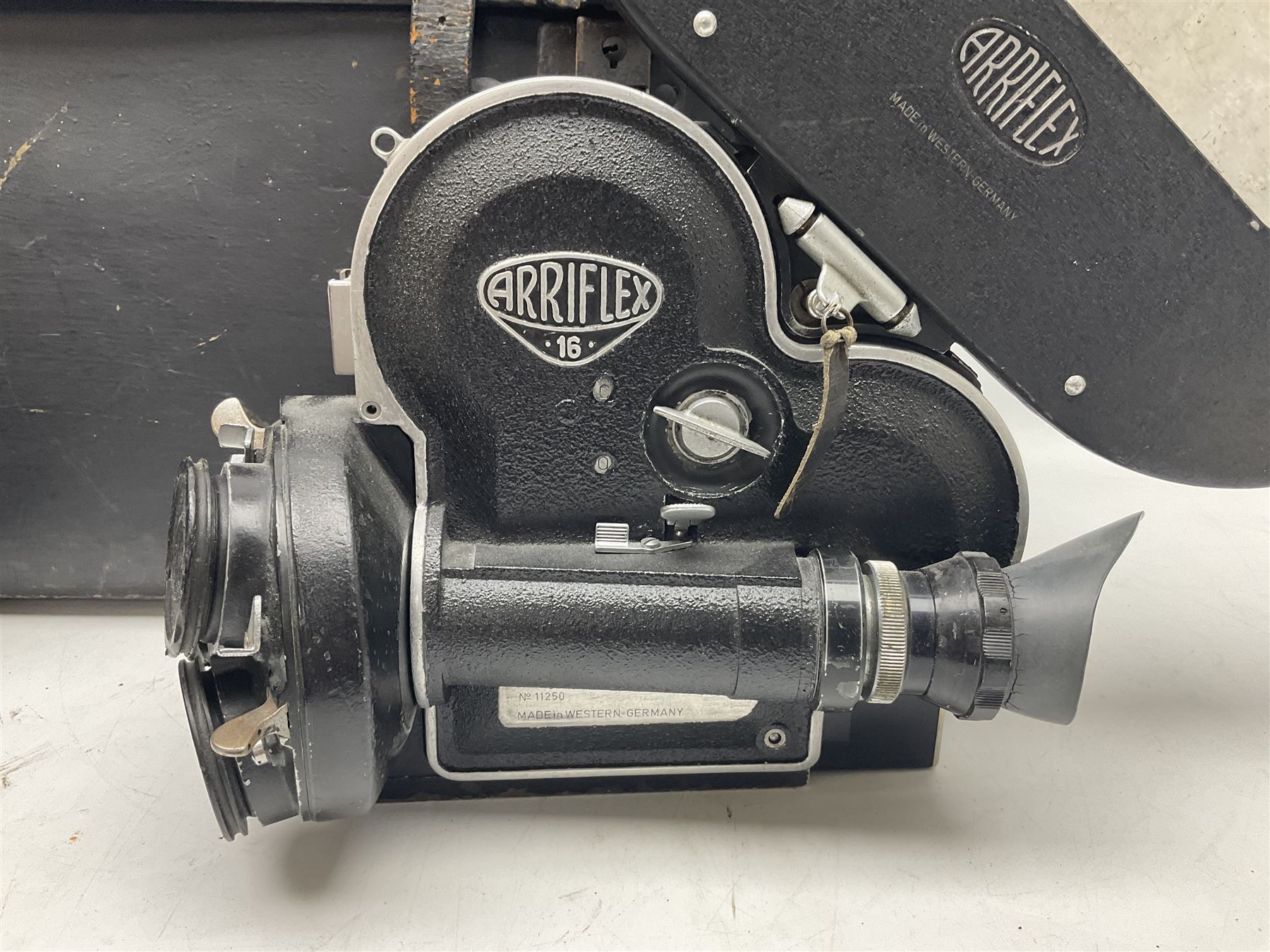 Arriflex 16 camera body, serial no. 11250, three 400ft magazines, cased filter set, 'Angenieux-Zoom Type 4x17.5B F.17.5-70mm' lens, serial no. 1199886 cases and other Addiflex equipment in hard case 