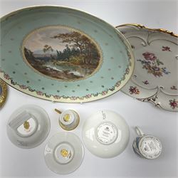 A French porcelain box and cover, of circular form printed with a central panel to the removable cover depicting a deer within a mountainous landscape, the whole heavily gilded, D16cm, together with a Coalport 'The Gilded Floral Coffee Cup' coffee can and saucer, a Dresden pot, possibly Franziska Hirsch, hand painted with courting couple and floral spray and sprigs, a Hammersley cabinet plate printed with a figural pastoral scene, a JLMenau plate of lobed form with printed foliate decoration, large cabinet plate with central printed panel of a riverside landscape, with spurious 'beehive' type mark beneath, plus 20th century Karlsbader porcelain teawares, comprising teacup and saucer, lidded sucrier and stand, and side plate, each heavily decorated in gilt, etc. 
