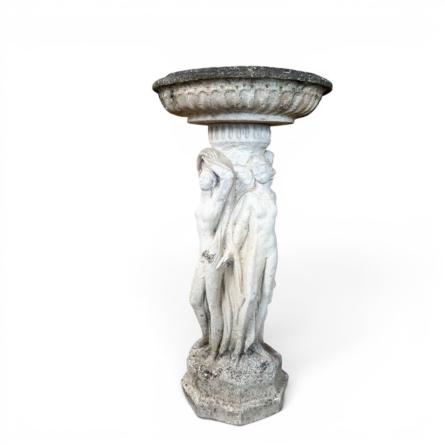Collection of decorative cast stone garden pieces, comprising three graces bird bath, three urn planters, urn base, figure of girl and a Scottie dog (7)