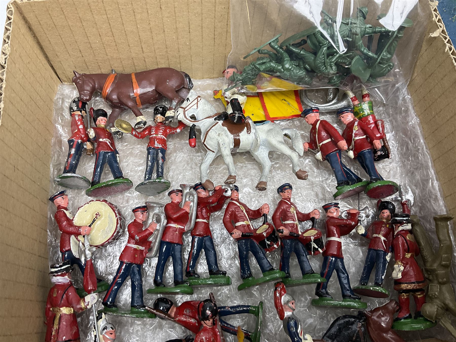 Sectional wooden fort on base with painted textured finish 46 x 36cm; together with over thirty lead and die-cast white metal soldiers and horses by various makers; and a small quantity of plastic figures of soldiers