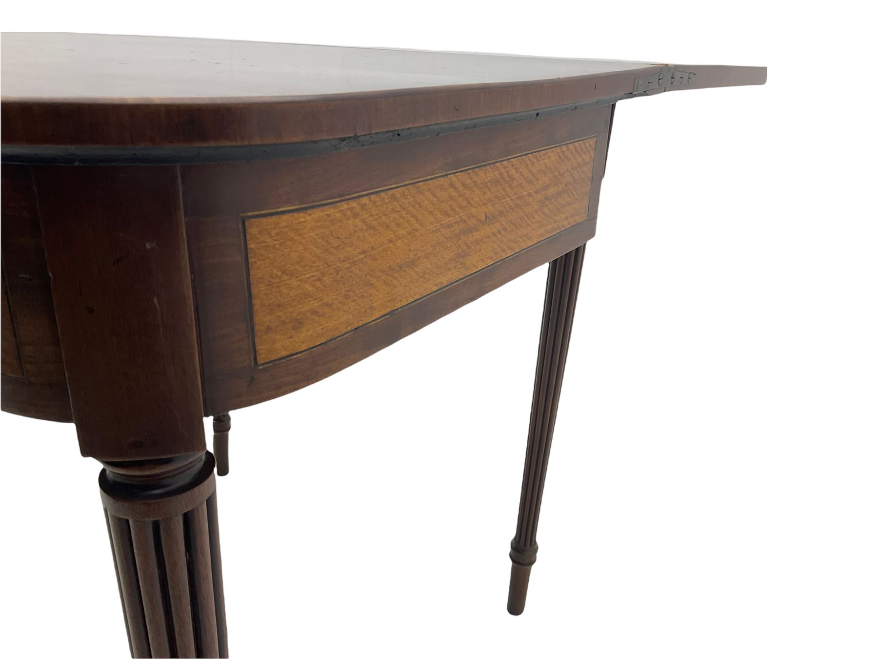 Early 19th century tea table, rectangular fold-over top with rounded corners, the frieze and sides inlaid with satinwood panels, double gate-leg action base, on reeded supports 