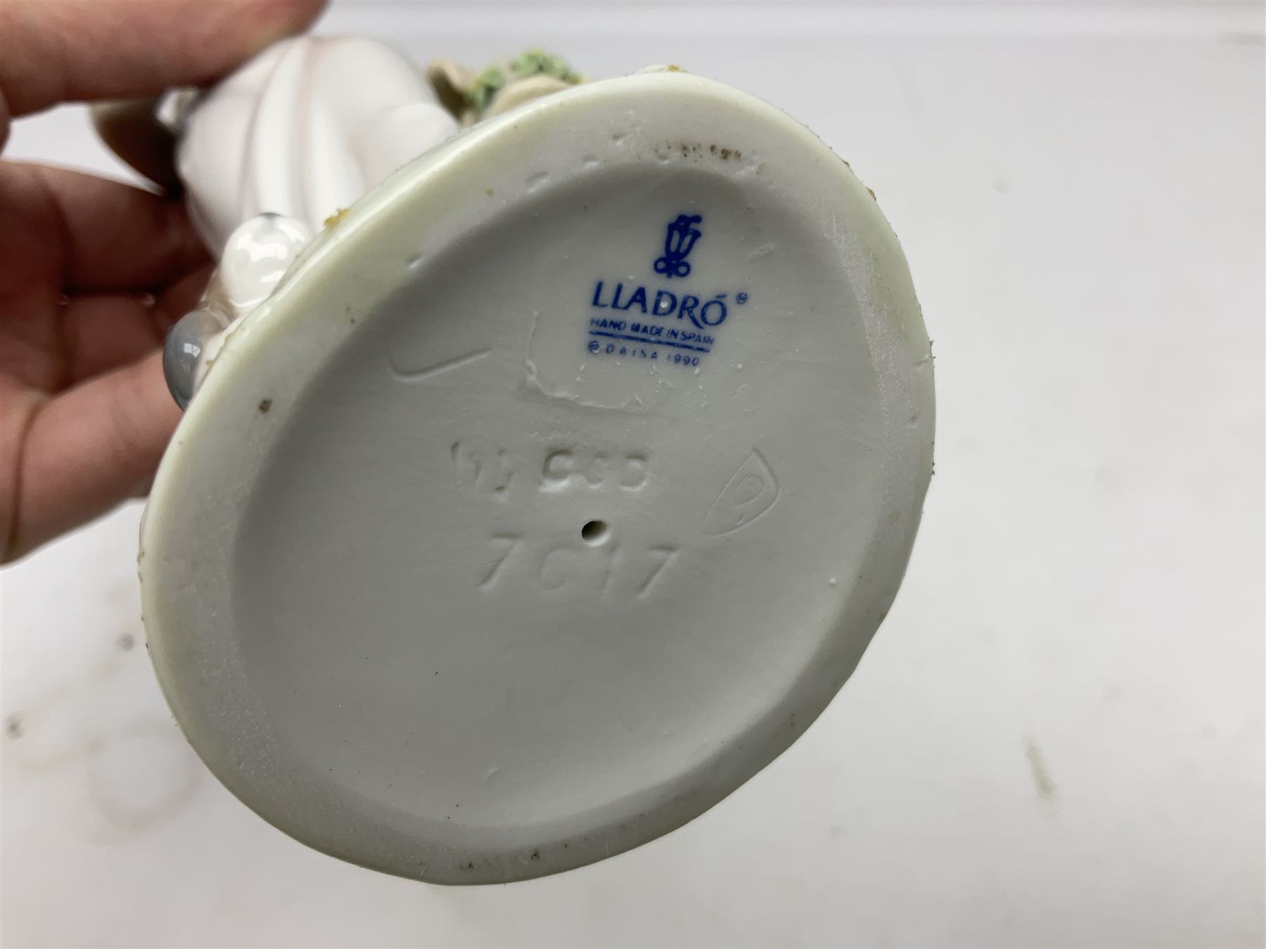 Three Lladro figures, comprising Garden Classic, signed no 7617, Summer Stroll no 7611 and Best Friend no 7620, all with original boxes, largest example H24cm 