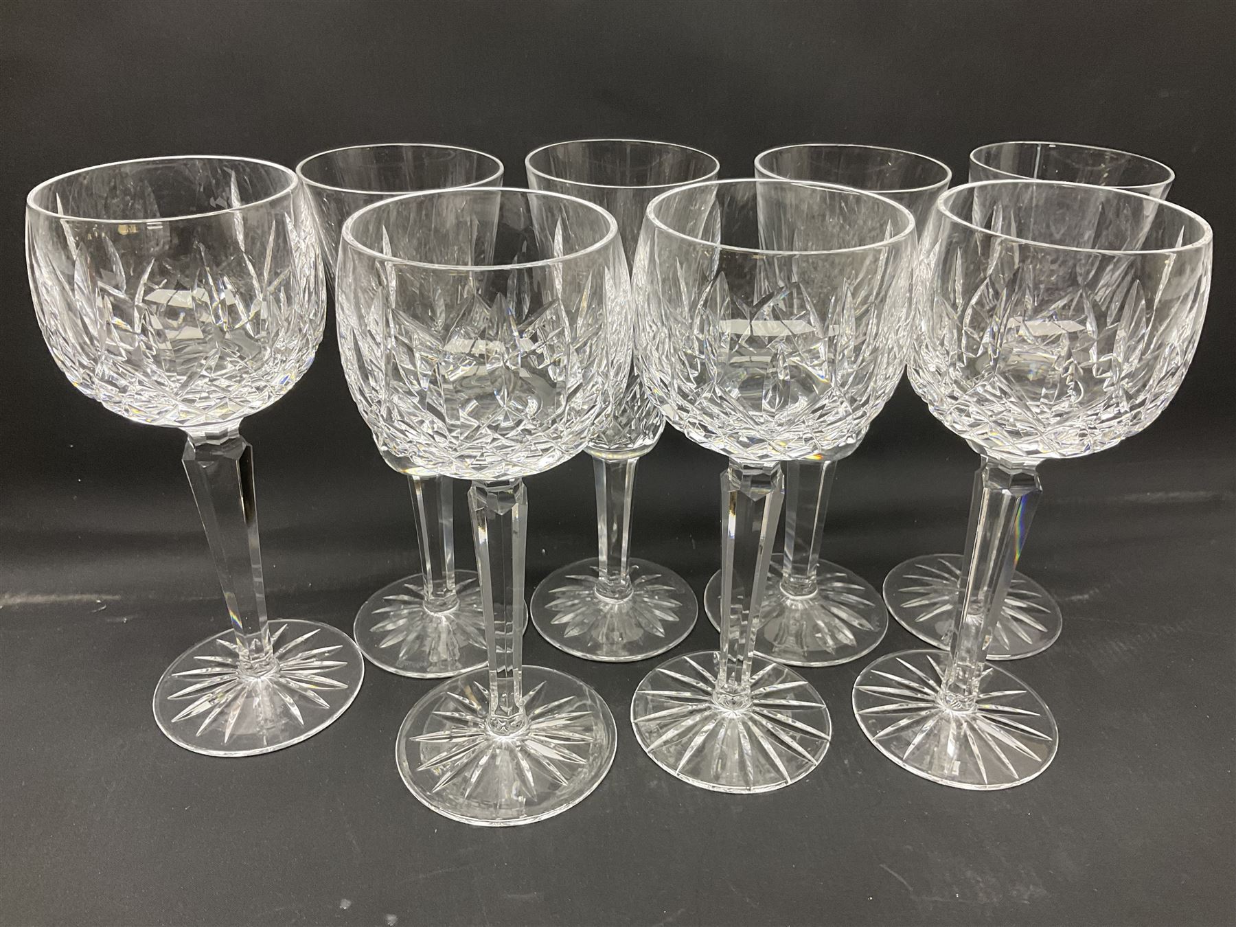 Set of Waterford Crystal Lismore pattern drinking glasses for six people, including hock glasses, goblets, champagne flutes,  sherry glasses, liqueur glasses, hi ball glasses, whisky glasses, brandy balloons, etc, all with etched maker's mark beneath  (62)