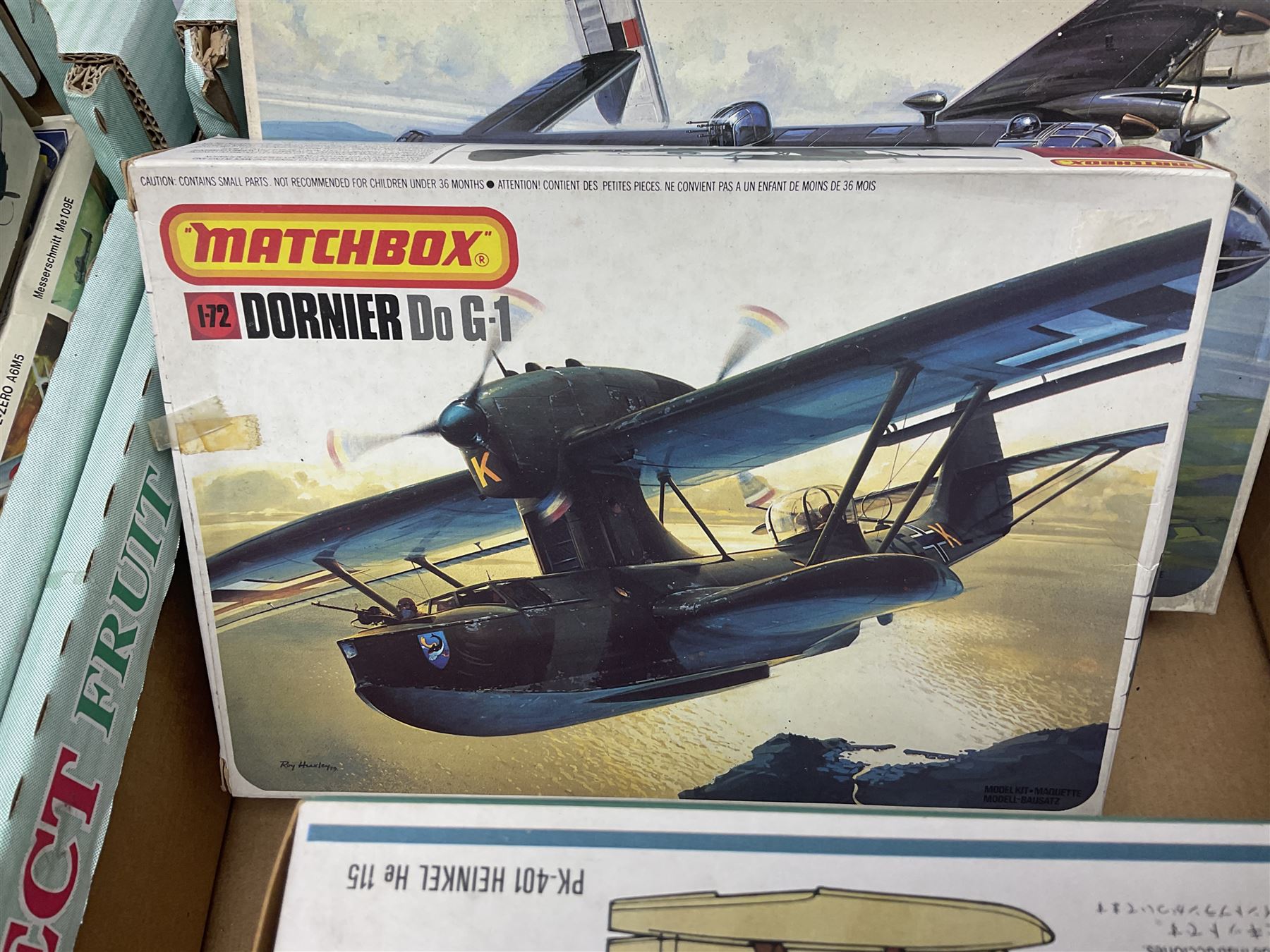 Twelve scale model kits, comprising ten model aircraft kits from Hasegawa, Nichimo, Fujimi and Matchbox, and two further Hasegawa 1:8 scale aircraft mounted machine gun kits, in two boxes 