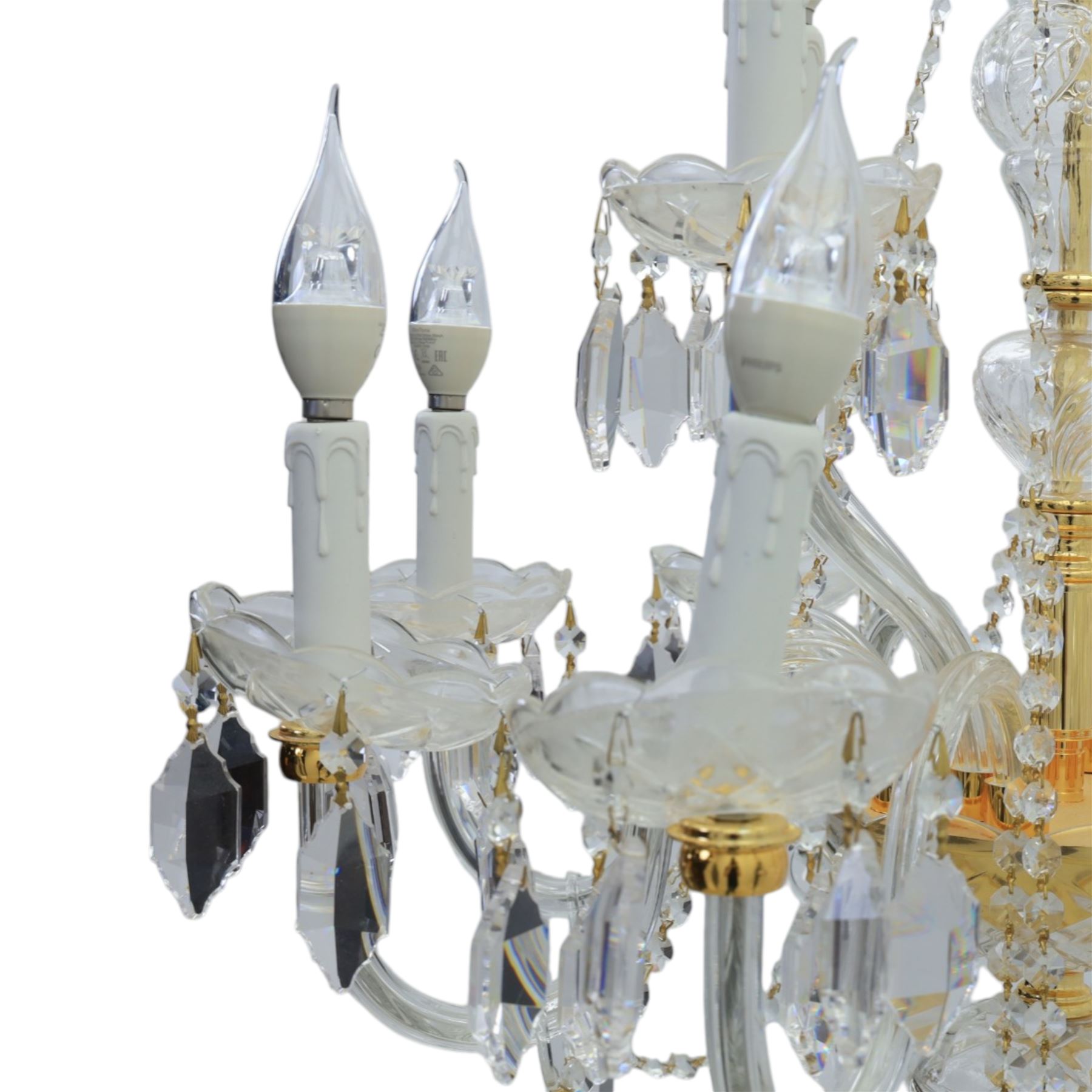 Late 20th century gilt brass and glass twelve branch chandelier, with glass swags and drops