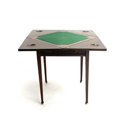 Edwardian envelope card table, inlaid baize top, four counter wells, stile supports and castors 