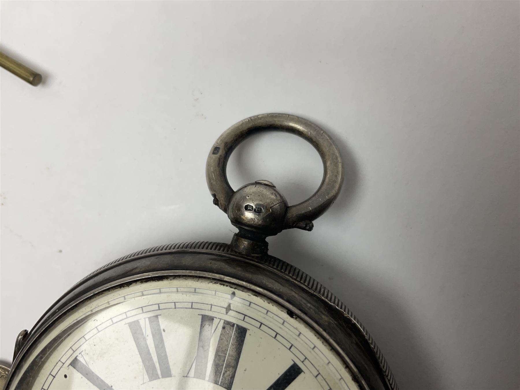 Victorian silver open face fusee lever pocket watch by D A Olswang, Sunderland, No. 7904, white enamel dial with Roman numerals and subsidiary seconds dial, case hallmarked Chester 1895 and a watch chain with silver fob and coin

 

