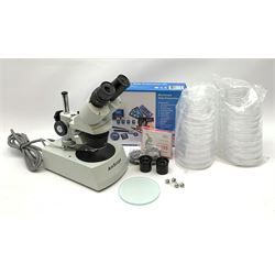 AmScope microscope, with various eyepieces and other accessories 
