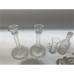 Group of 19th century and later clear glass decanter stoppers to include examples with cut decoration, together with pair of clear glass candlesticks, dishes etc