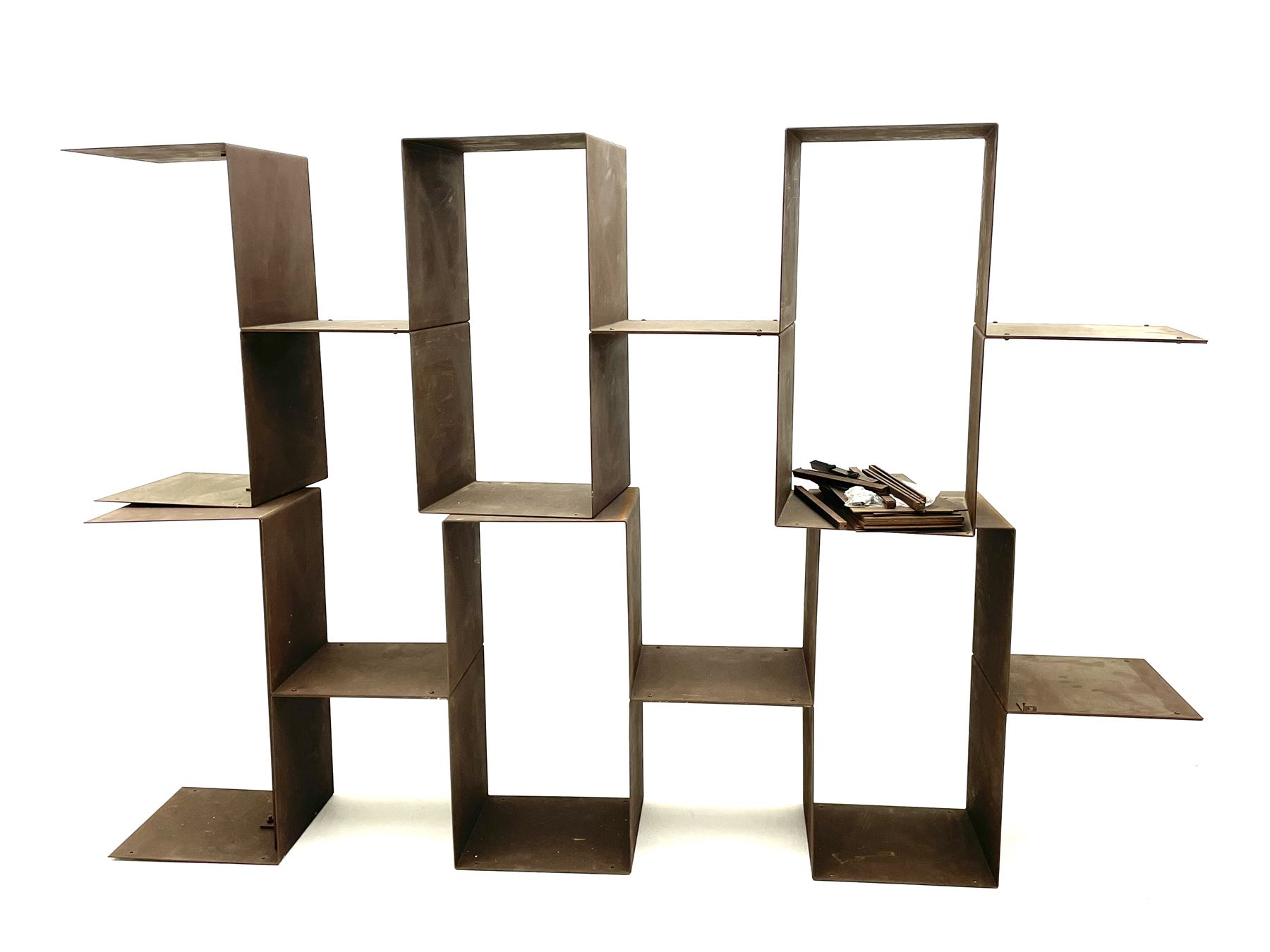 Retailed by The Conran Shop - four sectional modular shelving units, rusted metal finish, each unit - W212cm, H71cm, D33cm