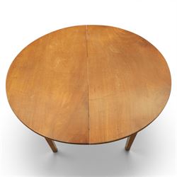 Mid 20th century teak extending dining table, together with eight teak chairs with green leather seats, extends to 154cm