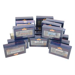 Twenty Bachmann 00 gauge plank wagons, including 37106 7 Plank Wagon 'Royal Leamington Spa' and 37126 8 Plank End Door Wagon 'Izal' examples, all boxed