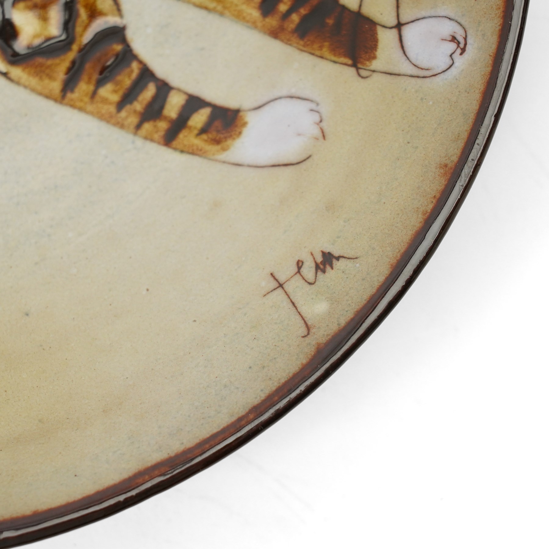 Joyce Morgan cat plate, signed to base, D21cm; George Selim for Goebel seated cat figure, H24cm, and a studio pottery figure of a Siamese, unsigned, H23cm (3)