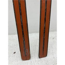 Pair of 1930s wooden skis, with painted metal runners beneath stamped Attenhofer, with retailers label for Ernst Gertsch Central Sports, L206cm