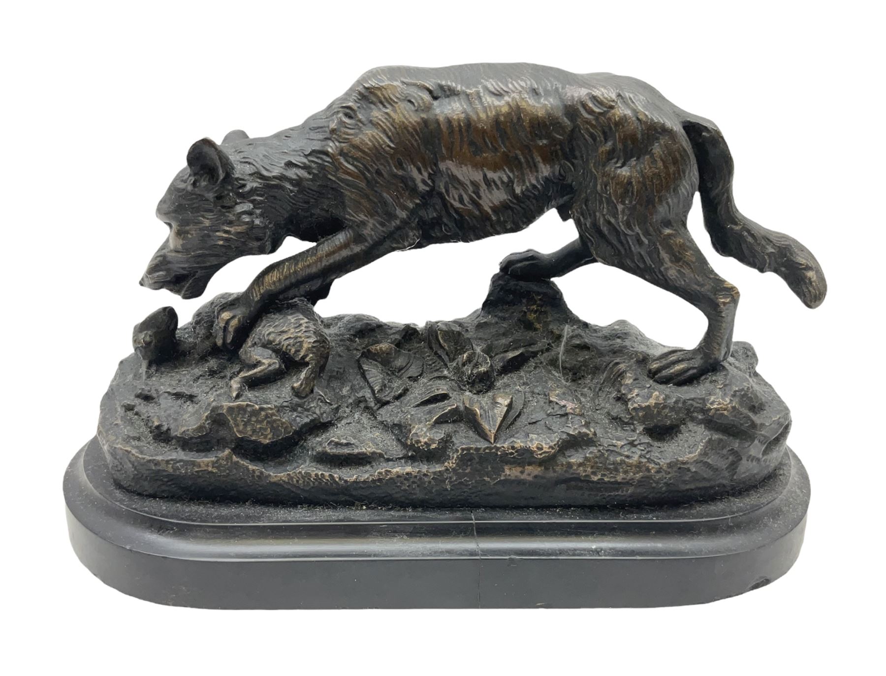 Bronze figure of a wolf with lamb prey, L18cm