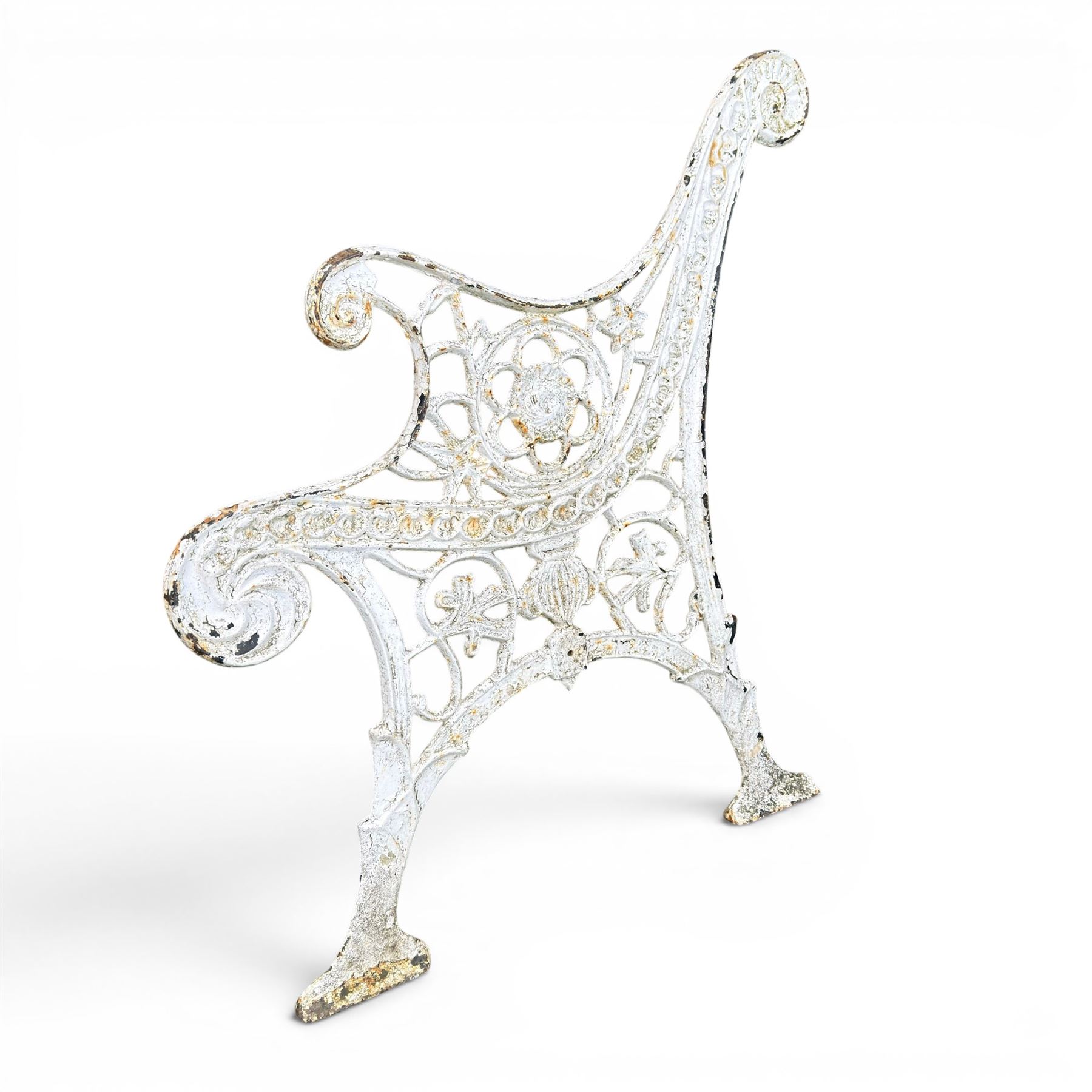 Pair of ornate painted cast iron bench ends, painted in white finish