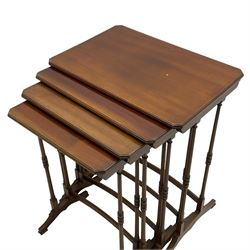 Early 20th century mahogany quartetto nest of four occasional tables, moulded canted rectangular tops on turned supports, on sledge feet