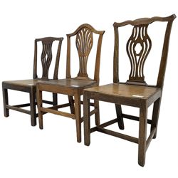 Three 19th century country elm chairs, each with shaped and pierced splats 