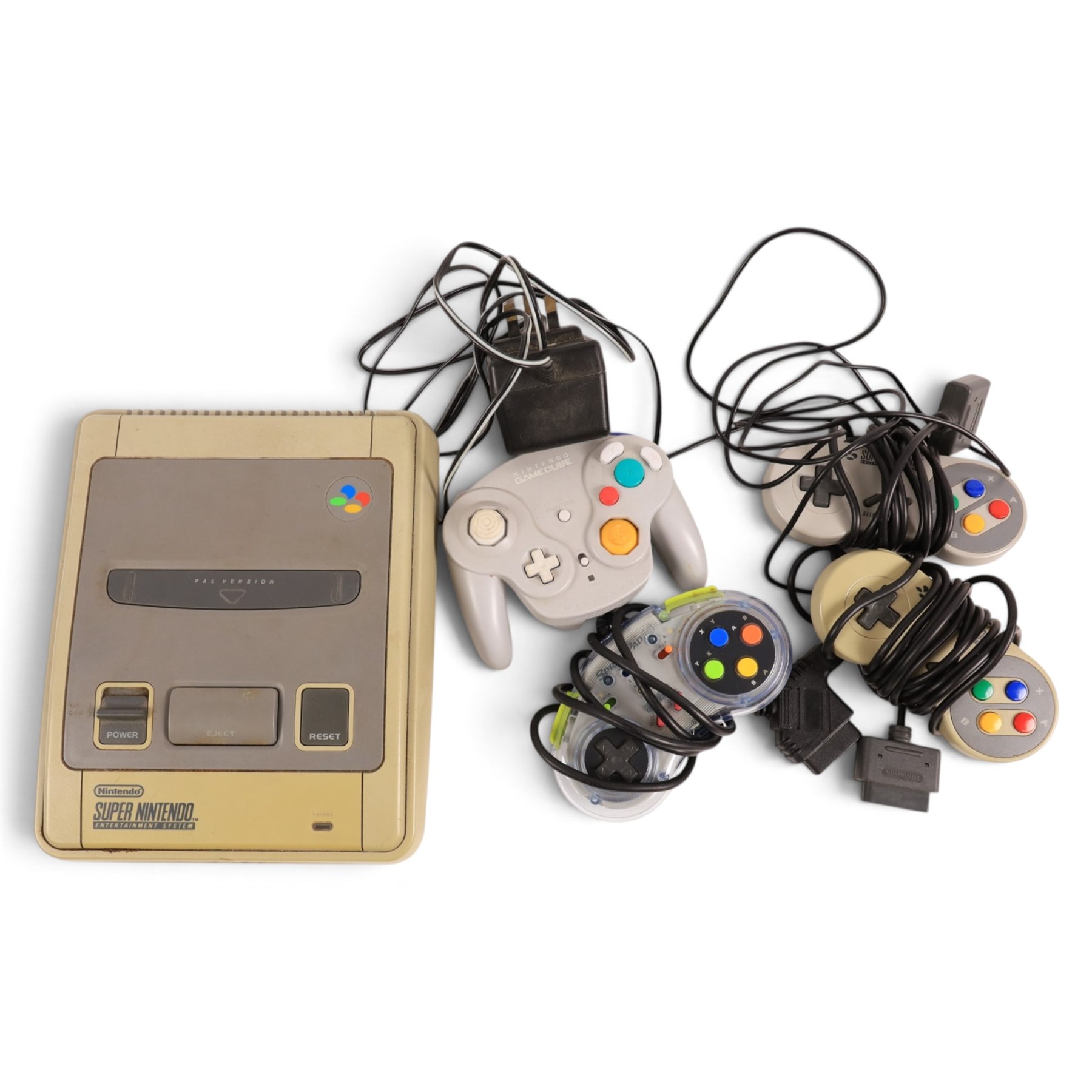 Super Nintendo Entertainment System console, three controllers including a Sprint Pad, a Nintendo Game Cube controller and a collection of SNES games, comprising Mystic Quest Legend, Flashback, Super Swiv, Eek The Cat, Street Fighter II, Dragons Lair, Jurassic Park Part II, Equinox, Donkey Kong Country, Super Mario World, Stunt Race, Super Tennis, Primal Rage, Alien 3, Starwing and F-Zero, all unboxed 