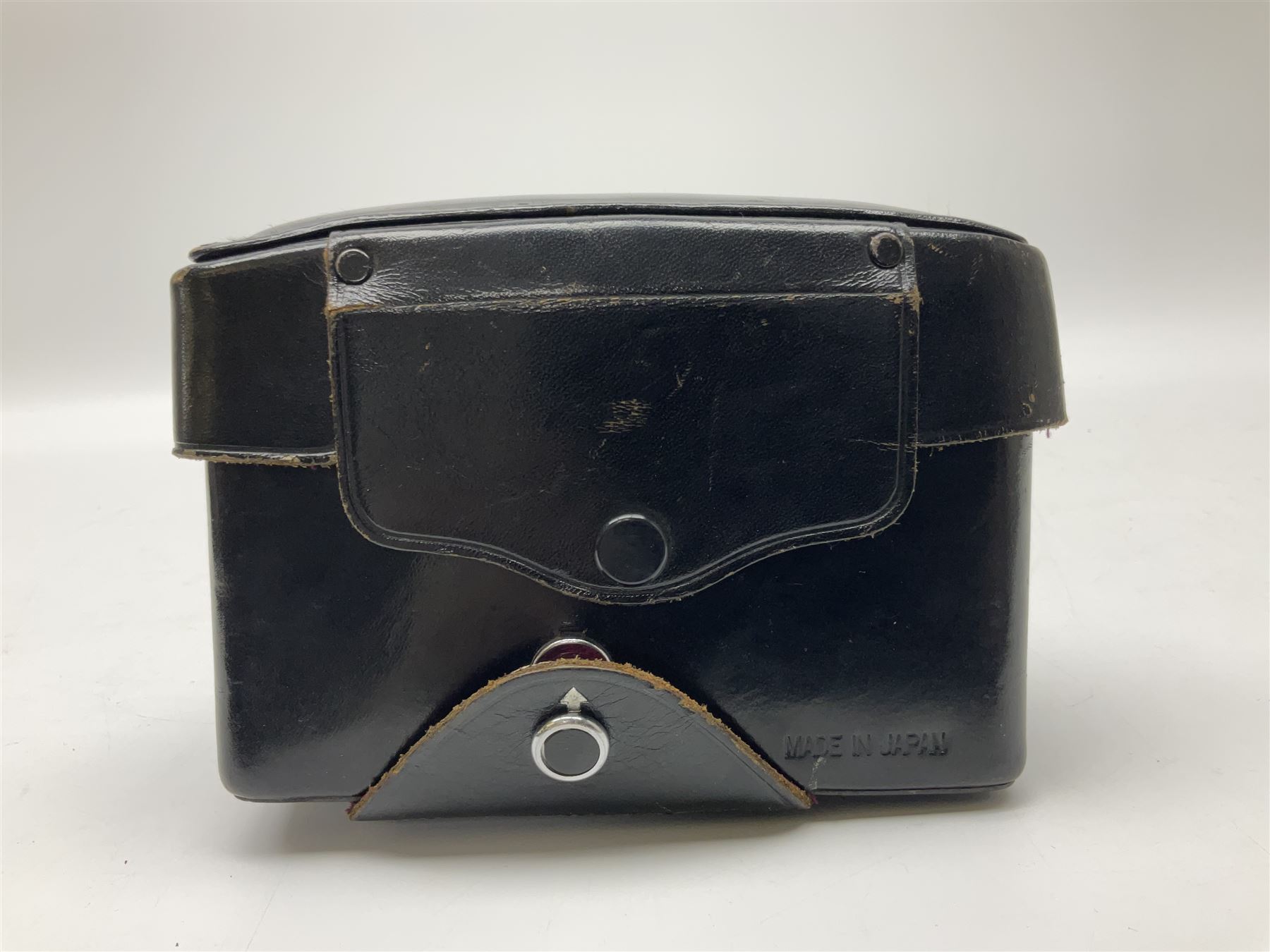 Topcon RE Super camera body, serial no.4681129, with 'RE. Auto-Topcor 1.8/5.8cm' lens, serial no. 11669018, in leather case