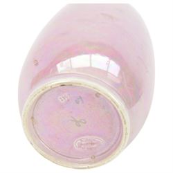 Ruskin Pottery vase, of baluster form, with blue vine decoration upon a pale pink lustre ground, with impressed mark beneath, H19cm