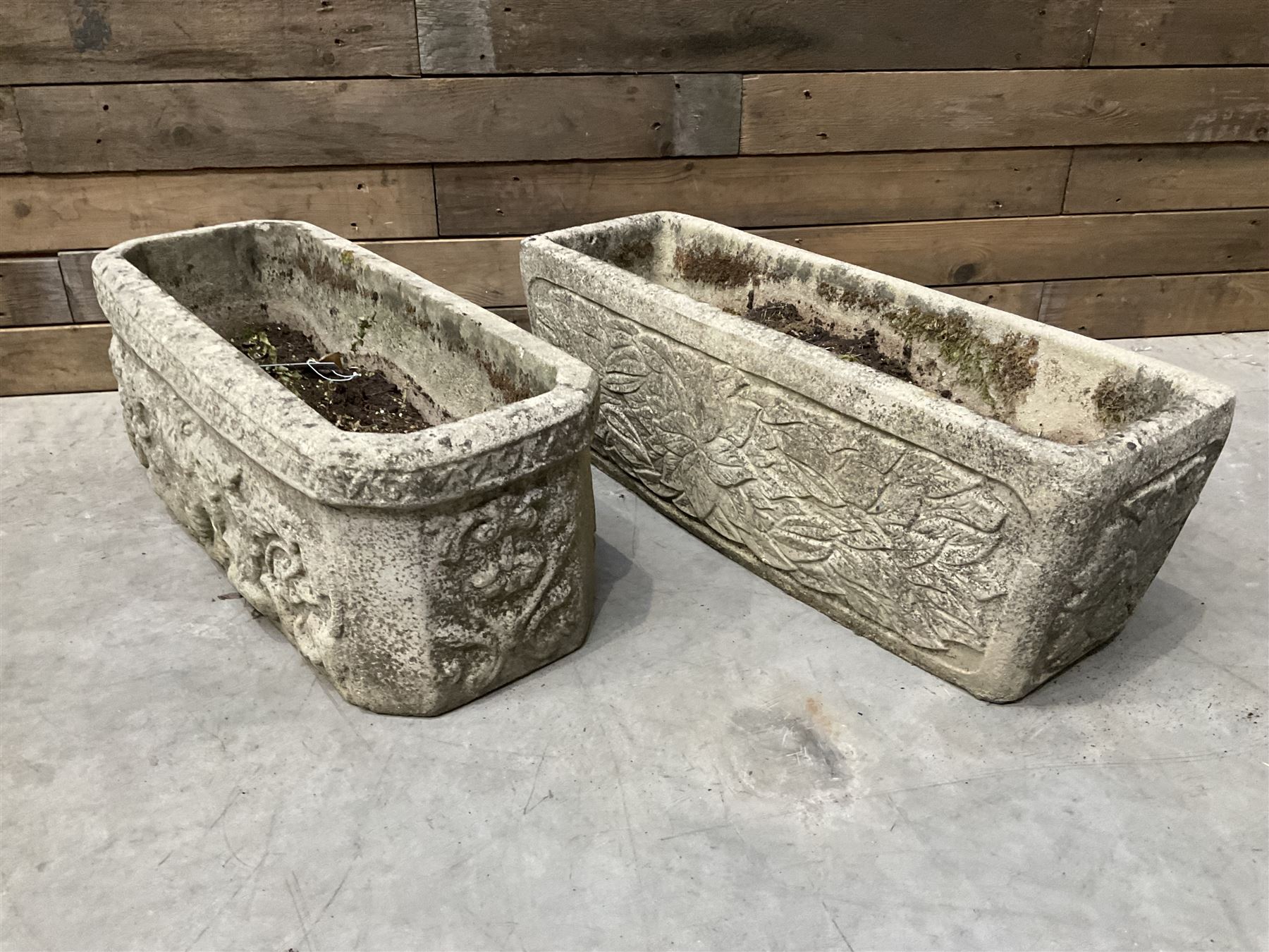 Ornate cast stone rectangular garden planter, lion mask and swag detail, and s similar planter (2)