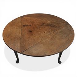 18th century oak folding cricket table, triangular top with three hinged demi-lune leaves, raised on tapering supports with pad feet