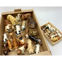 A large collection of mainly Bulldog and other dog figurines, to include a number of examples by Beswick, Sylvac, and one by Royal Doulton, 
