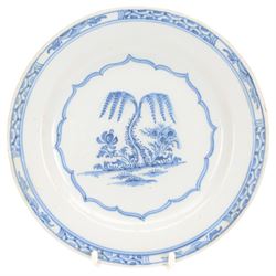 Five 18th century blue and white English and Dutch Delft plates, to include an example probably by the Abigail Griffith Delftworks in Lambeth, London, circa 1765-1775, depicting a landscape scene with house and tree, contained within geometric borders, D23cm, largest example D30cm 