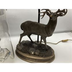 Two table lamps, one in the form of a deer, the other of baluster form with a red and black ground,  lampshade and another light fitting, largest table lamp H62cm