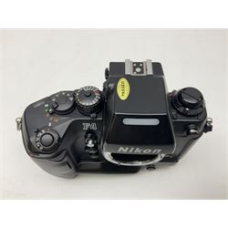 Nikon F4 camera body, serial no. 2467020, with Nikon MB-21 battery pack