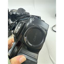 Six Minolta Dynax SLR camera bodies, comprising 800si serial no. 62703606, three 7xi examples, including one boxed example, serial nos. 20106944, 16123311 & 22107553, and two 9xi examples, serial no. 18209901 & 18202113, with three Minolta lenses, including Zoom xi 28-105mm 1:3.5(22)-4.5 lens, AF Zoom 28-85mm 1:3.5 (22)-4.5 lens and an AF Zoom 75-300mm 1:4.5(32)-5.6 lens, Hama carry case and other accessories