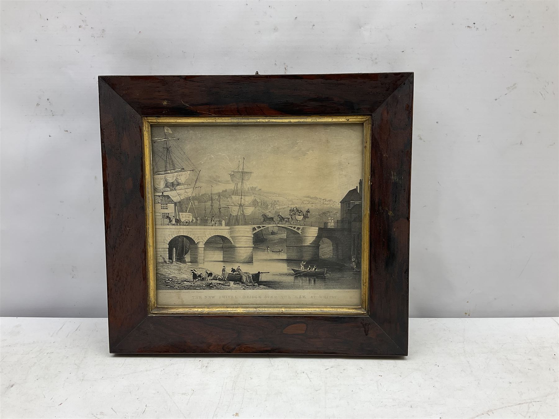 After Francis Pickernell: 'The New Swivel Bridge over the Esk at Whitby', engraving pub. c1835, 22cm x 25cm in original rosewood frame; an interesting collection of prints, engravings and watercolours relating to Whitby (a lot)