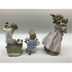 Three Lladro figures, comprising Playing Mom no 6681, Little Riders no 7623 and Pick of the Litter no 7621, all with original boxes, largest example H24cm