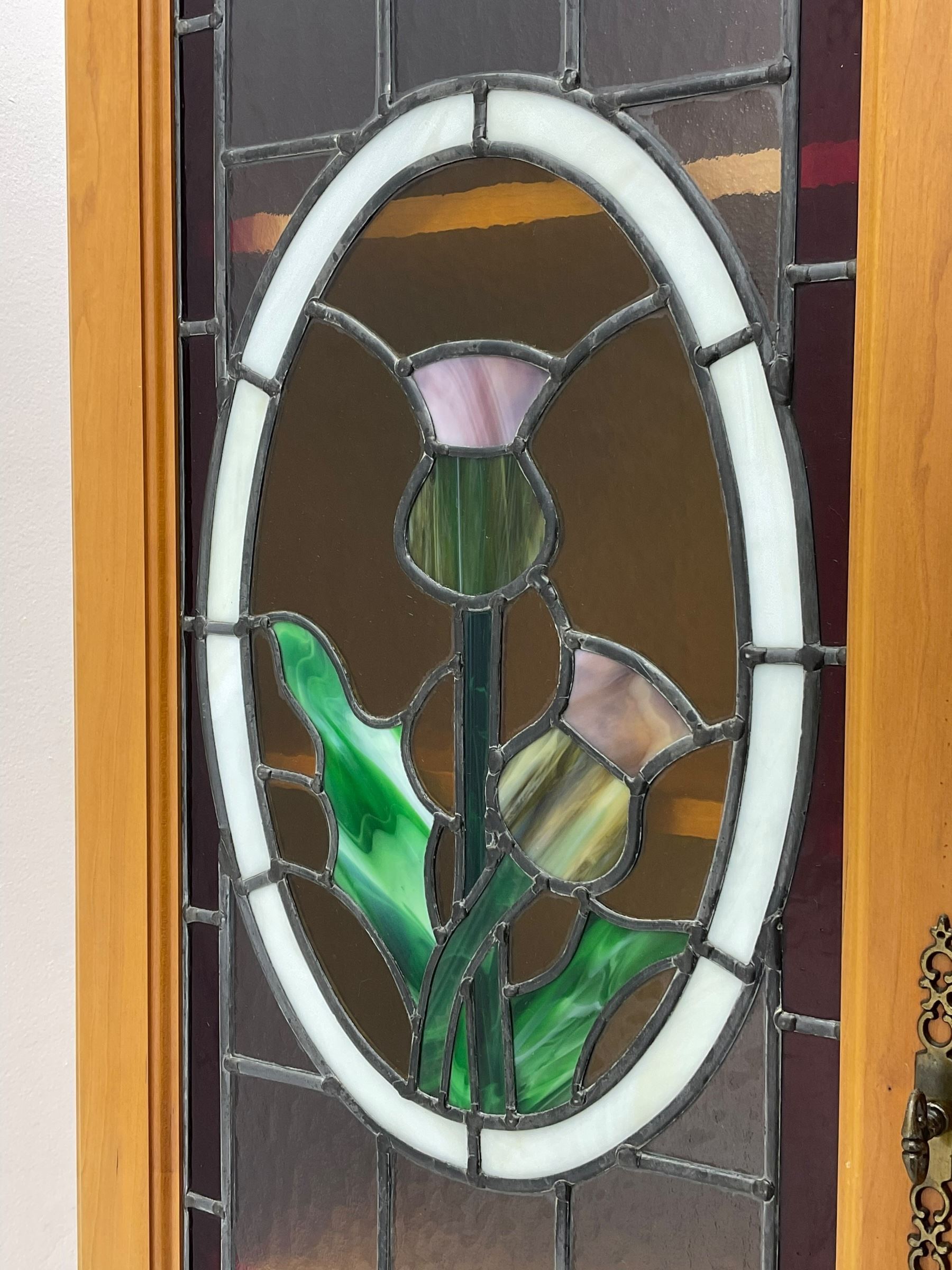 Art Nouveau design cherry wood kitchen wall unit, two leaded glazed doors with stained tulip decoration