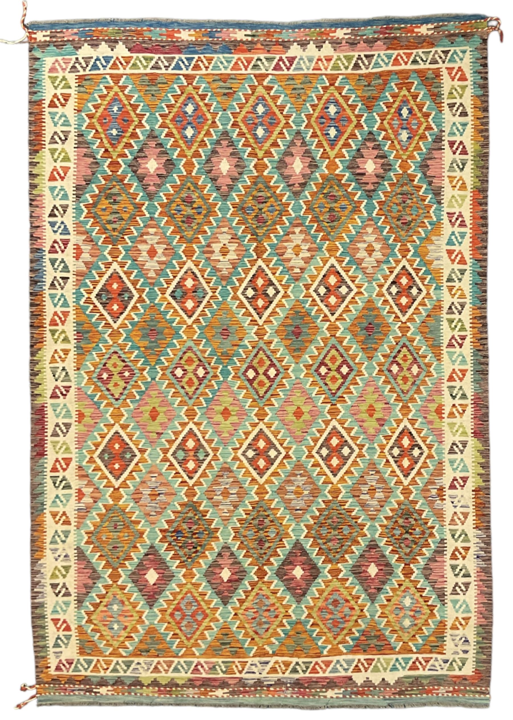 Anatolian Turkish Kilim multi-colour rug, decorated with all over lozenges in contrasting colours with ivory outline, the multi-band ivory border with repeating geometric shapes and small lozenges or diamonds