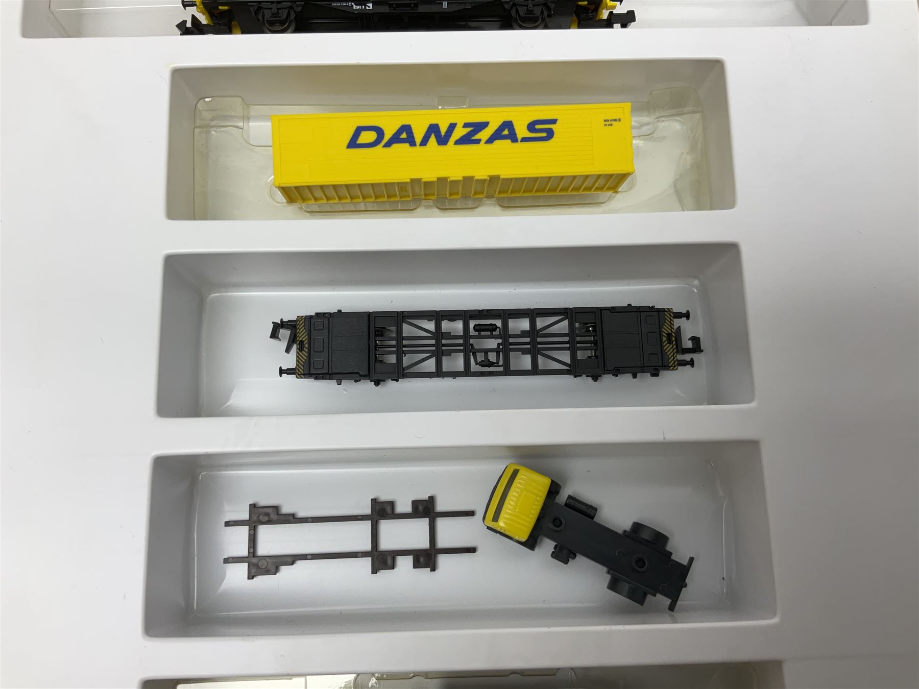 Trix Minitrix 'N' gauge - No.12363 'LINT' Diesel Powered Rail Car 'bendy' train; boxed; and No.11411 DB Zugset 'Danzas' goods set; boxed (2)