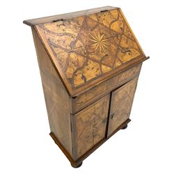 18th century elm and fruitwood writing bureau of small proportions, the lift-up sloping lid inlaid with geometric bandings and central twelve-point star, fitted with book rest, double cupboard below with further geometric bandings and two six-point stars, the sides with lozenge panels, lower moulding over turned feet