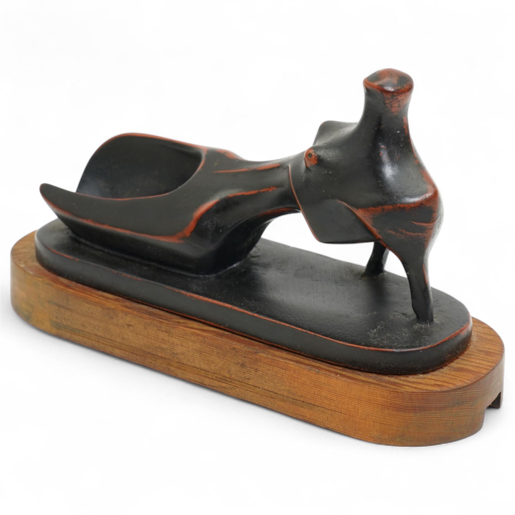 After Henry Moore (British 1898-1986): 'Reclining Figure', terracotta maquette sculpture, base marked with affixed catalogue label inscribed 'Reclining Figure: 1945 Archive 0041731', W21cm H12cm
