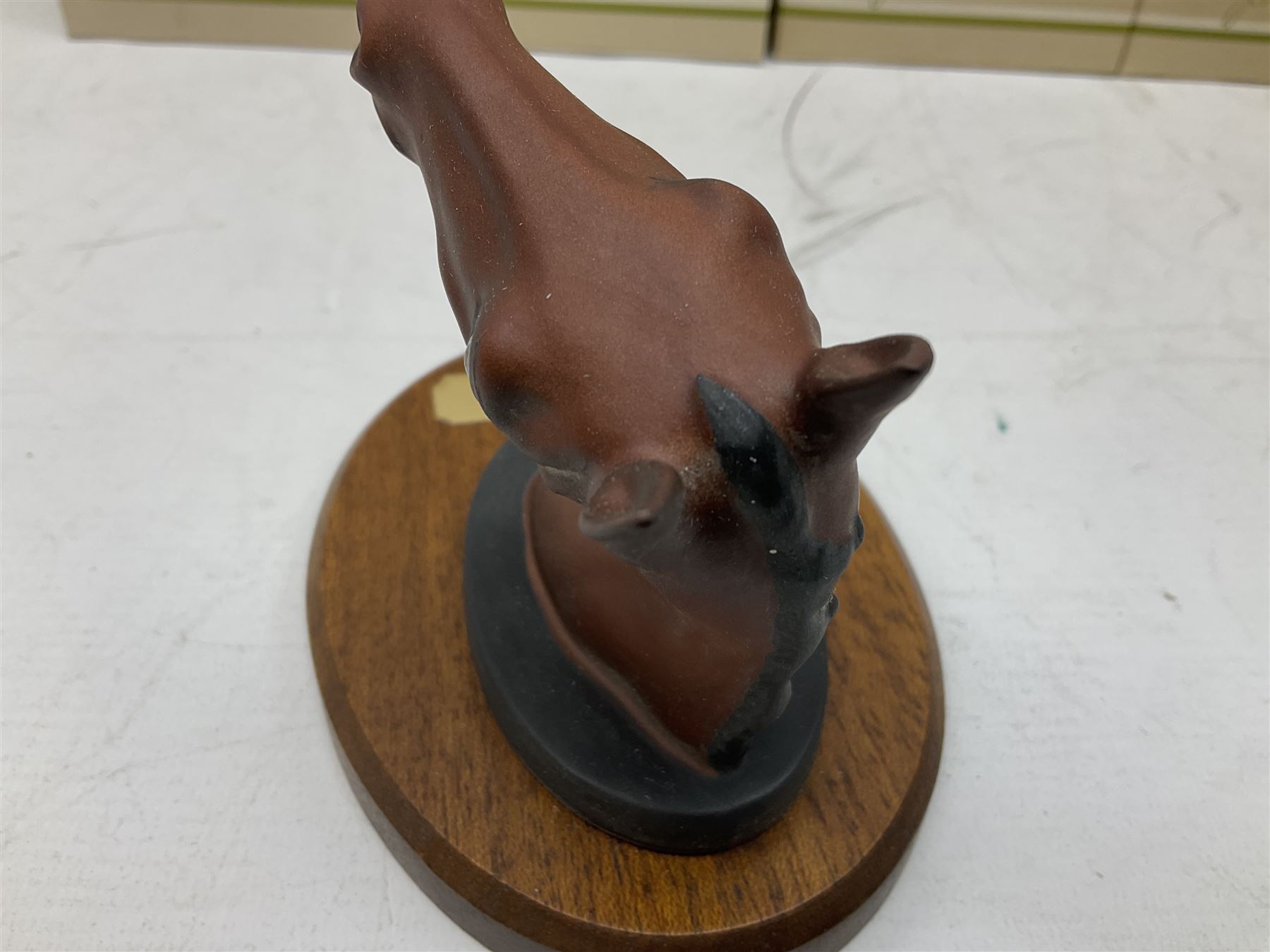 Beswick set of horse head wall plaques 'Champions all', comprising Arkle no.2700, The Minstrel no.2701, Red Rum no.2702, Troy no.2699, all with original boxes