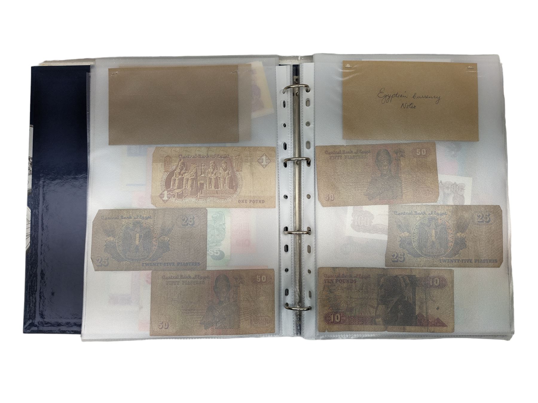 Great British and World banknotes, including two Bank of England Gill five pounds 'SA79432020' and 'SA79432021' various Somerset one pounds etc, Reserve Bank of New Zealand fifty dollars, various The States of Jersey one pounds, Singapore ten dollars etc, housed in a ring binder folder