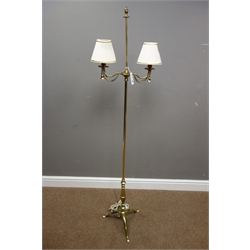  Late 20th century brass two branch lamp (H155cm), and a 20th century walnut standard lamp on turned column (H152cm)  