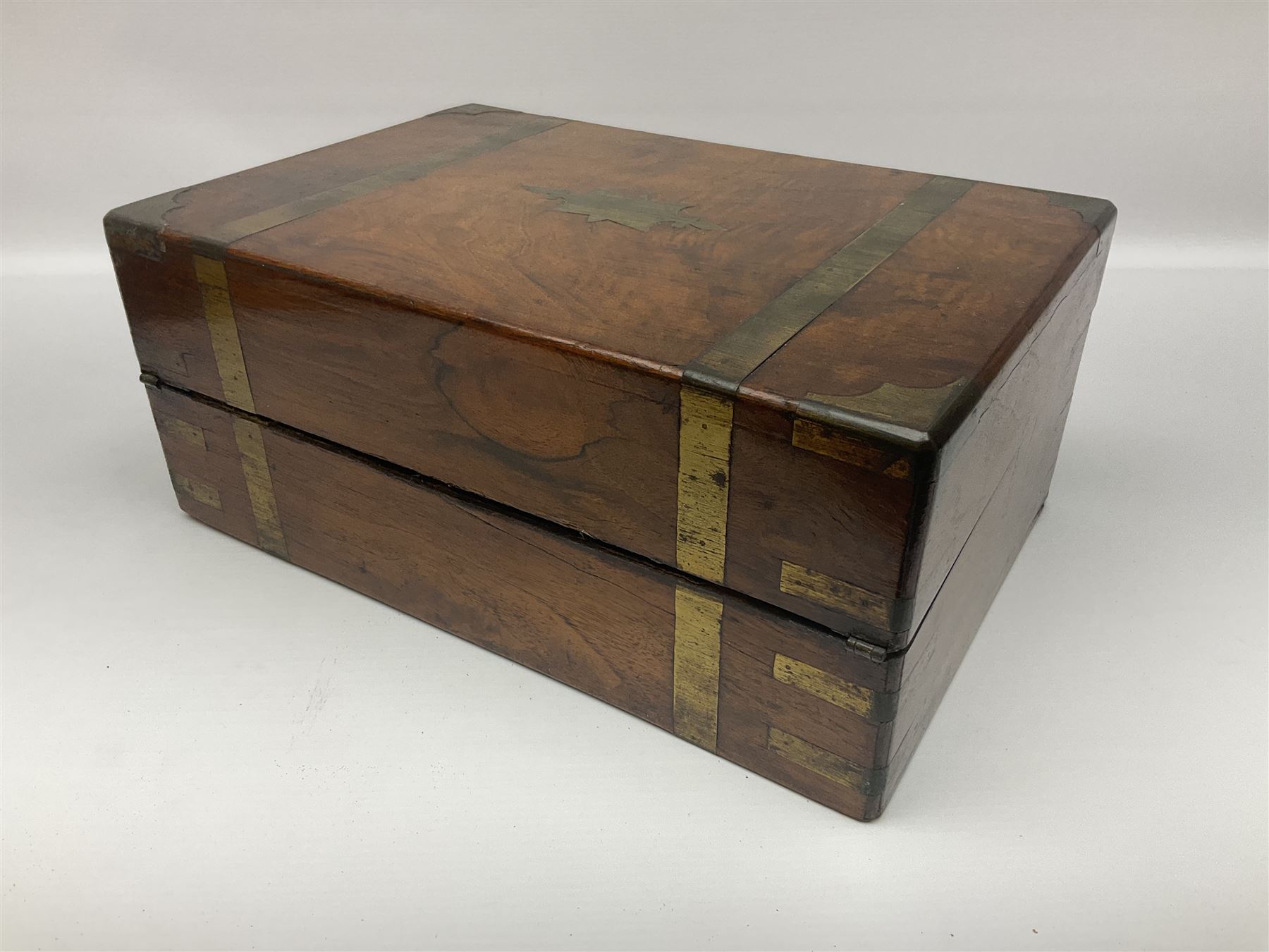 Victorian mahogany writing slope, the brass bound hinged cover opening to reveal tooled leather and gilt interior with two glass inkwells, together with a similar parquetry inlaid writing slope, with central mother of pearl inlay enrgraved 'Sarah', tallest H17cm 