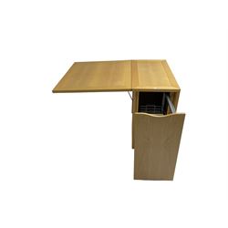 Skovby - 'SM101' drop leaf dining table, fitted with concealed storage compartment 