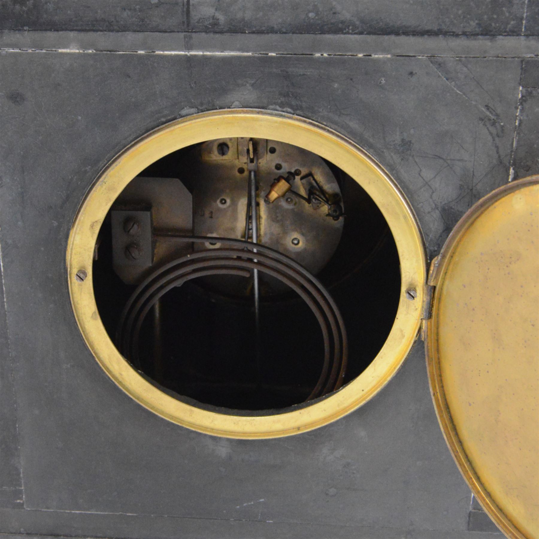 Large Victorian slate and variegated rouge marble architectural mantle clock, with gilded bronze mounts, with eight-day movement, striking a coiled gong, not running 