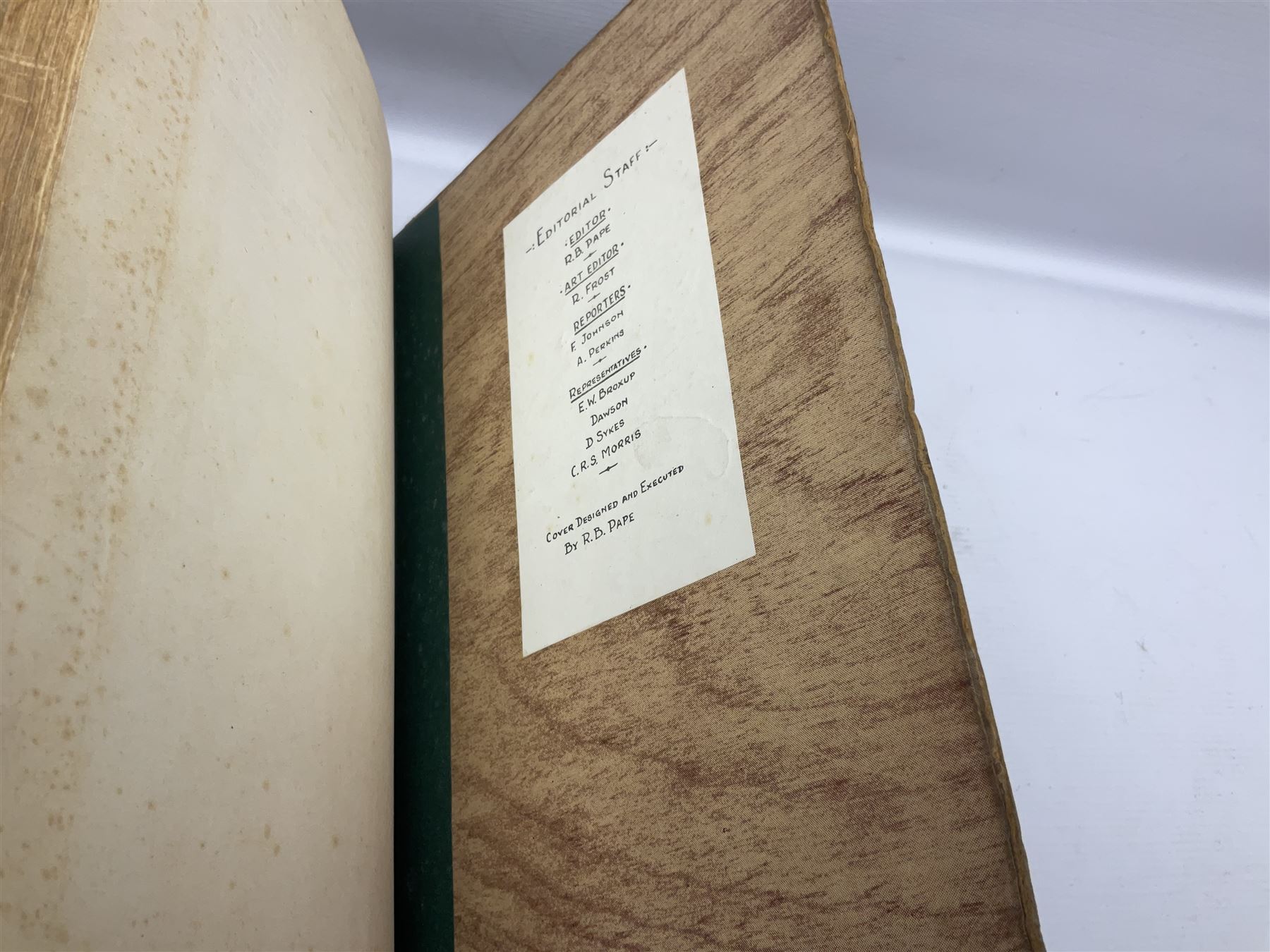 The Yorkshire Post Kriegie Edition. A 1945 book reproducing the exploits of Prisoners of War in Stalag Luft VI, with compliments letter from the publishers. Simulated wood paper covered card boards.